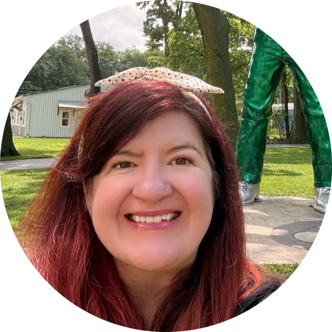 Woman with red hair, outside. 